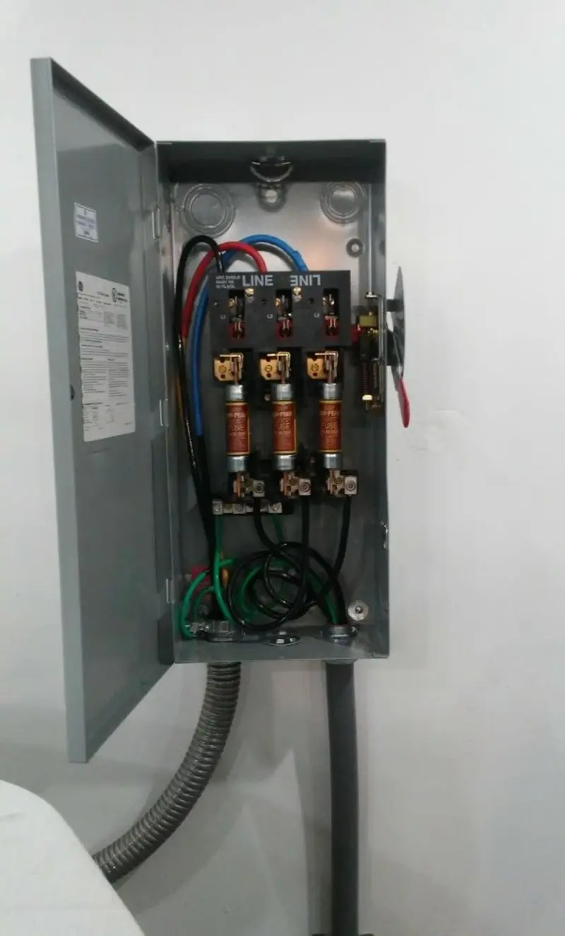 Three-phase disconnect switch installed for Smoke Detector Installation in Palm City