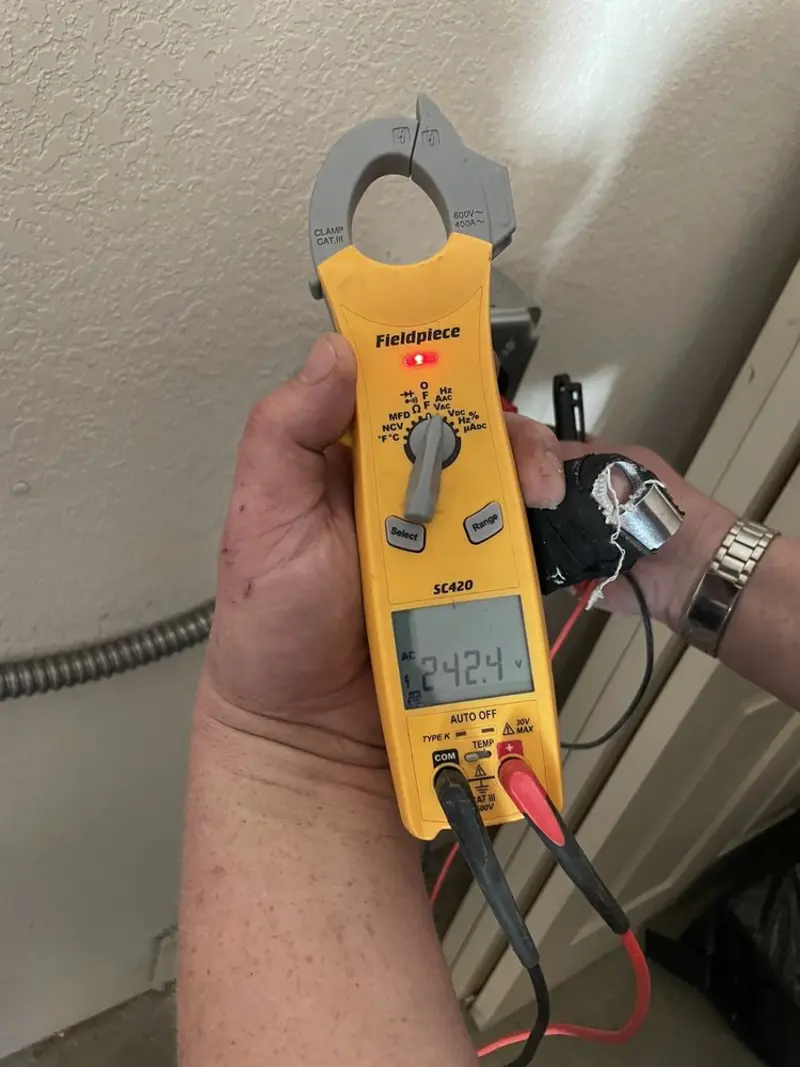 Voltage testing with clamp meter during Generator Installation in Palm City